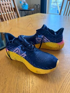New Balance Navy Running Shoes with Yellow Midsole and Pink Accents